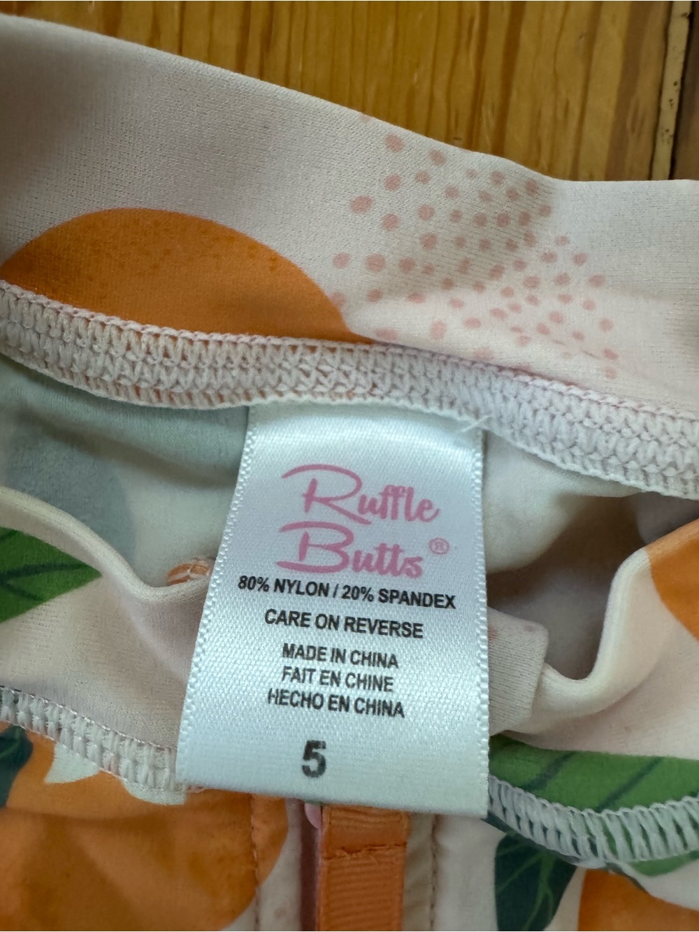 Ruffle Butts Orange Print Rash Guard - Picture 3 of 3